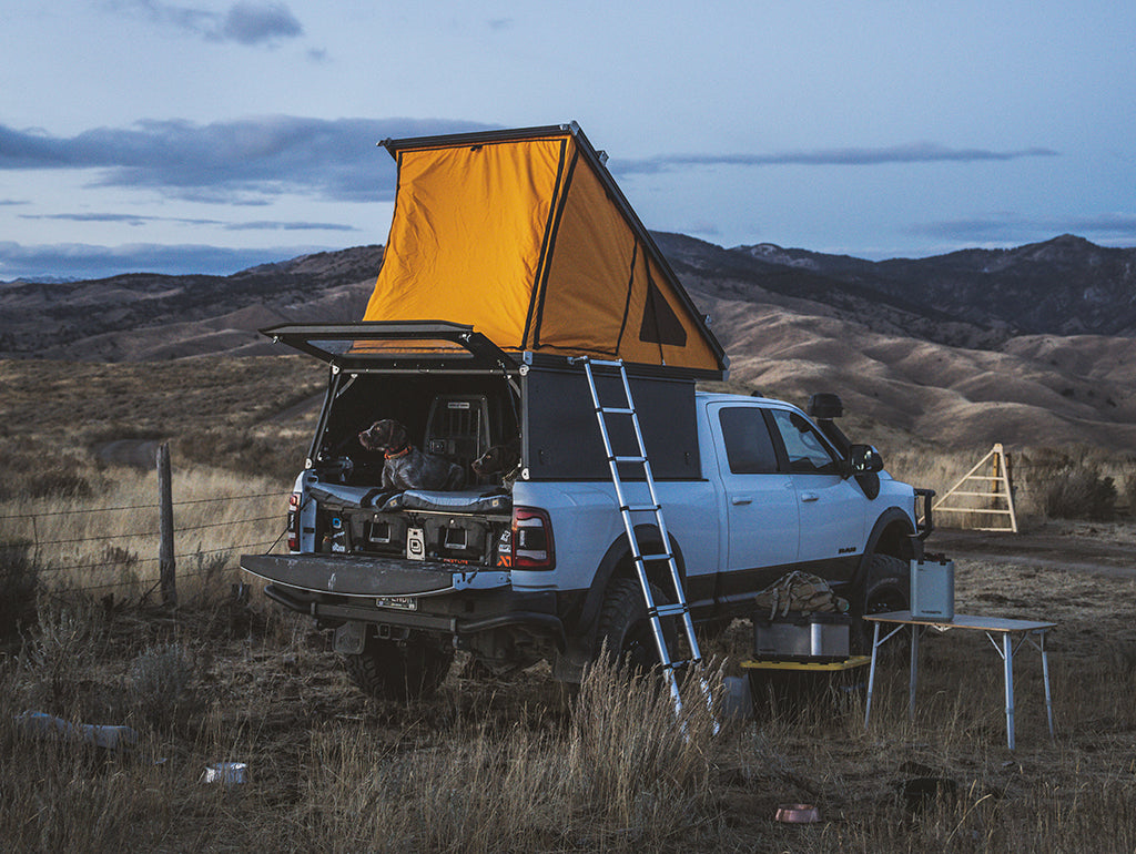 Matt's camp setup includes a GoFast Camper and collapsible furniture