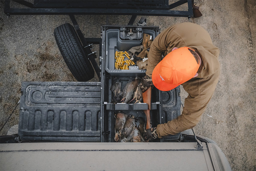 Travis Warren stows his gear and birds in his DECKED Drawer System