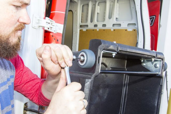 Putting Wheel on Drawers