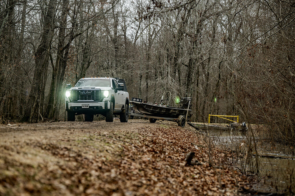 GMC Sierra pulls small boat trailer out of water