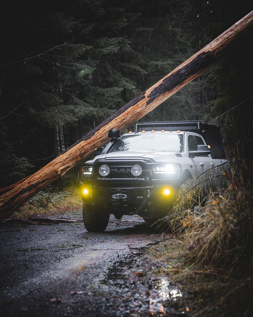 The Power Wagon slips underneath a downed tree on a back road in Oregon