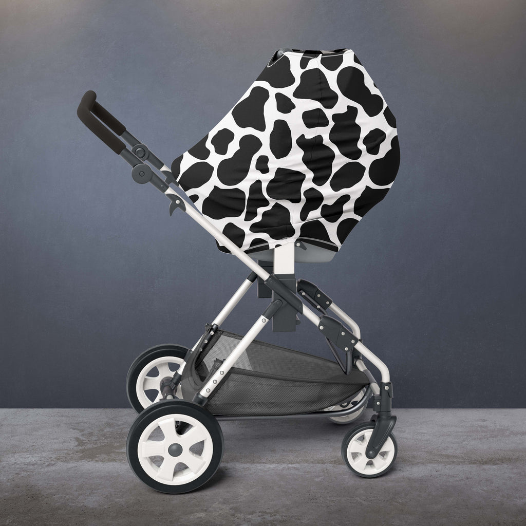 cow print car seat and stroller