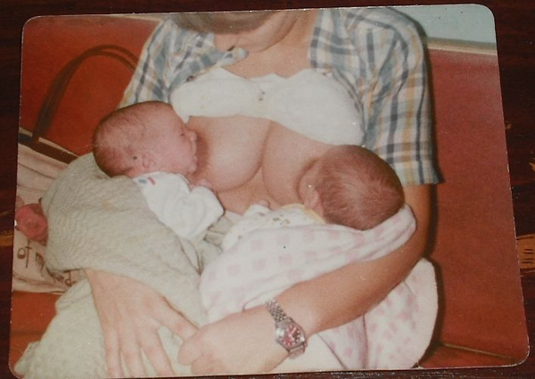 Twins breastfeeding vintage photo