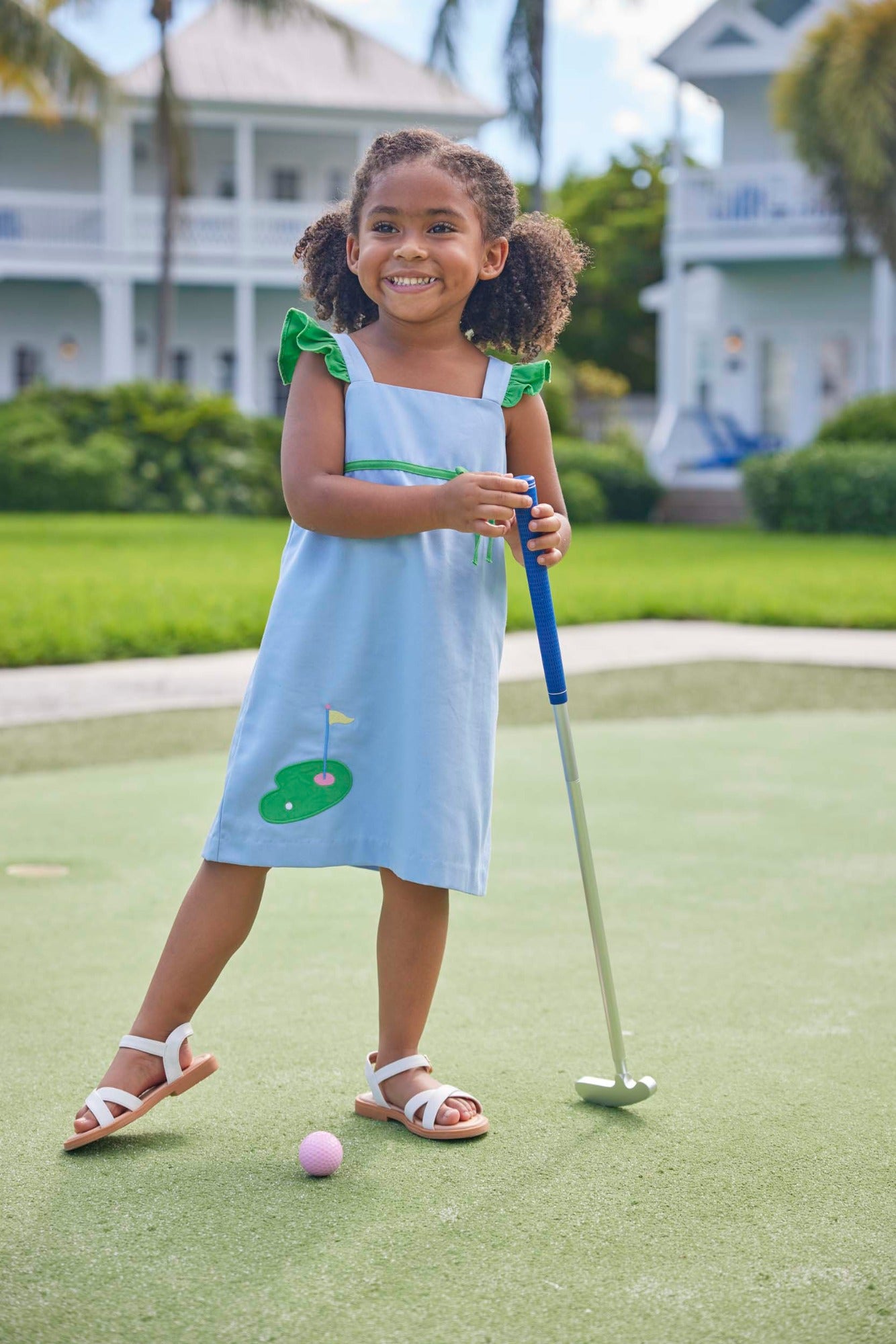 classic childrens clothing girls blue dress with green ruffle sleeves and applique golf