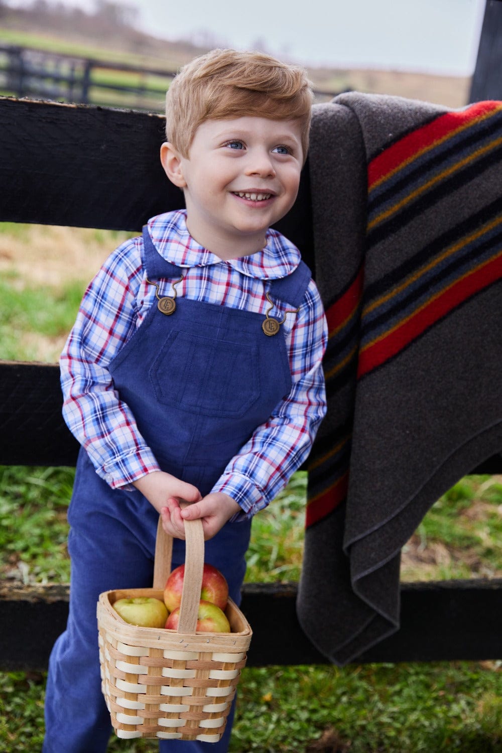 classic childrens clothing boys shirt with peter pan collar in blue and red plaid pattern