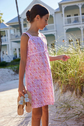 classic childrens clothing girls strappy pink and orange floral dress with pink piping and skinny bow