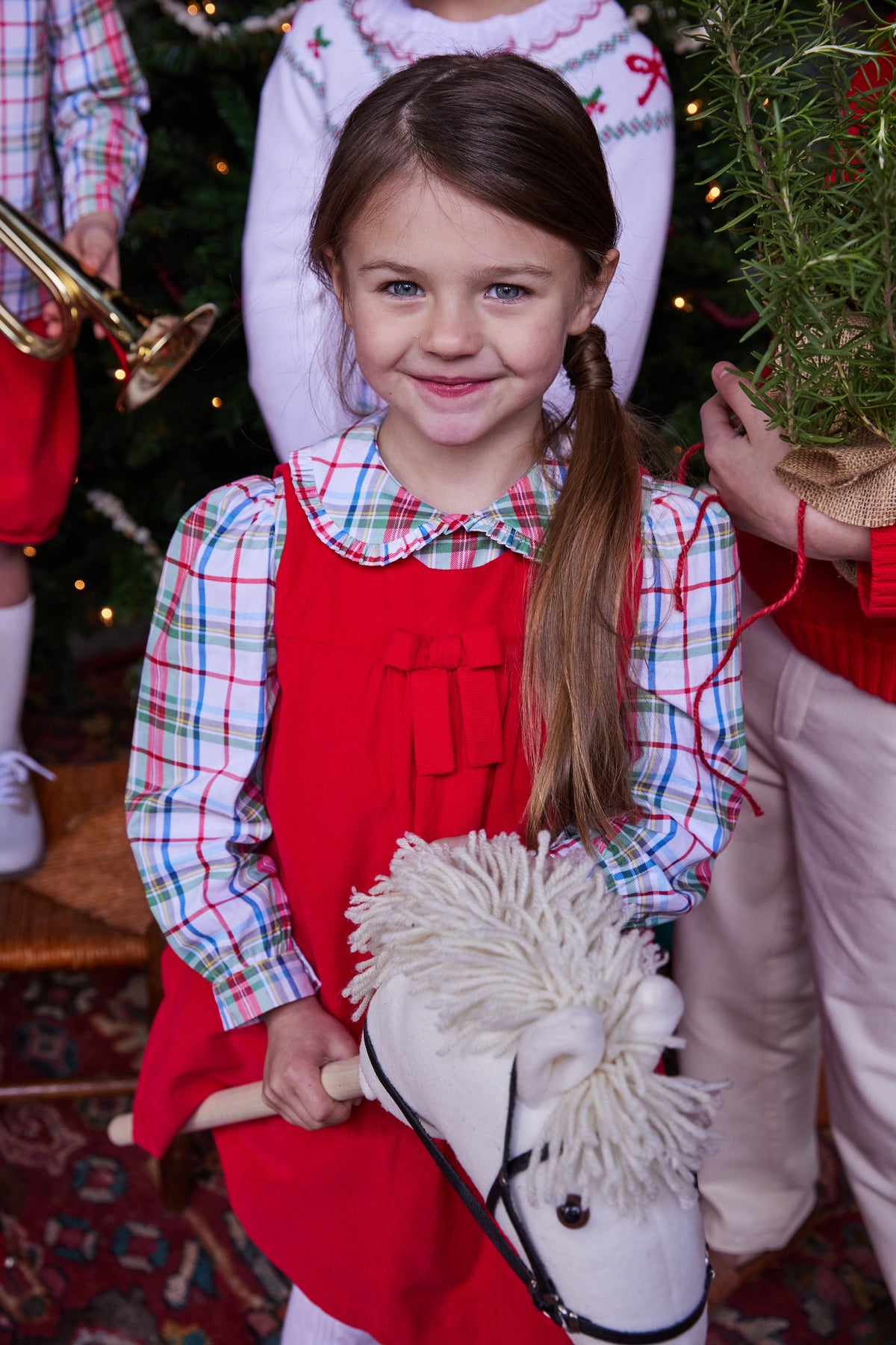 classic childrens clothing girls red jumper with pleating and bow in front