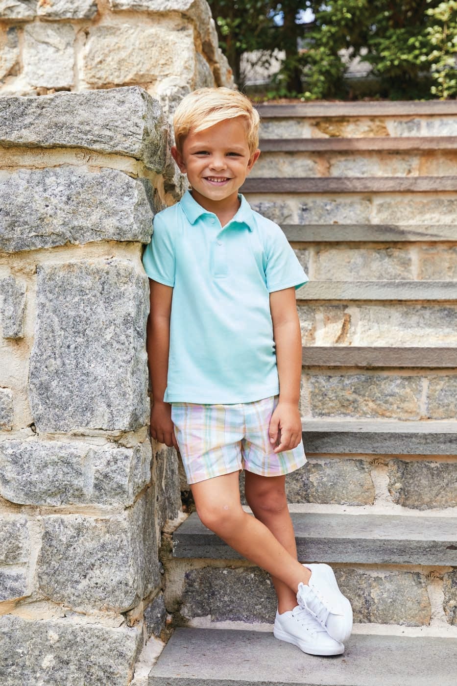 Short sleeve solid polo in aqua with basic shorts in derby plaid 