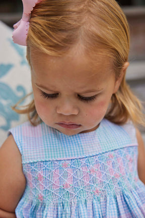 classic childrens clothing girls bubble in blue and pink plaid with blue smocking detail