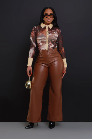 Swank girl with brown bootcut faux leather pants paired with a stylish top, mini purse, sunglasses and a pair of stilettos