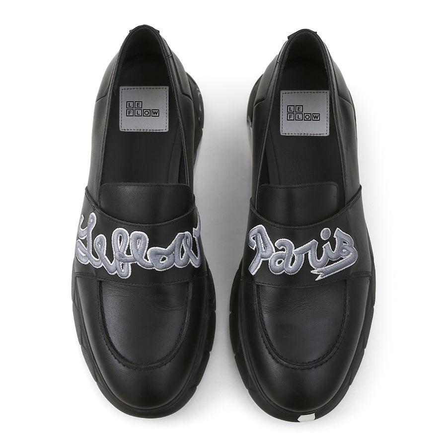 black designer loafers