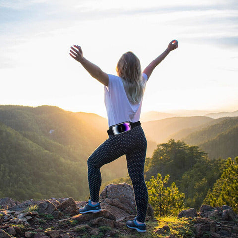 Female hiker on a trail enjoying the view