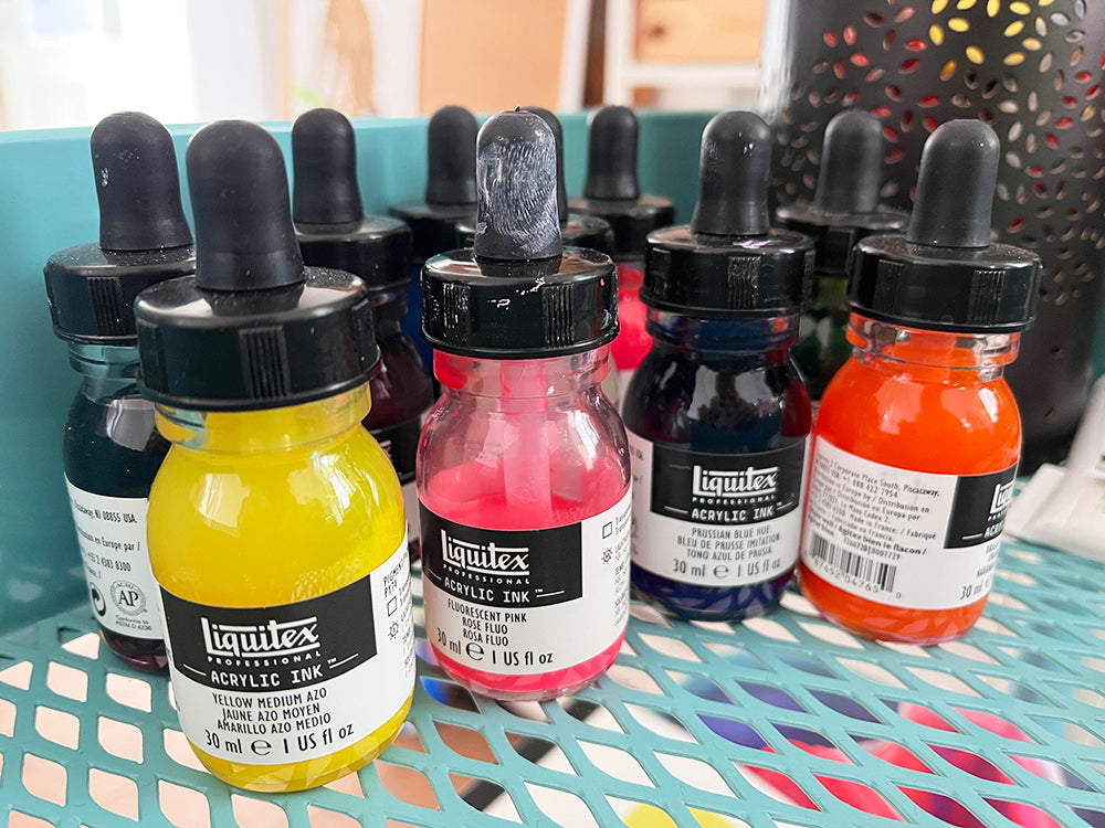 Liquitex ink bottles in Lee Foster-Wilson's studio