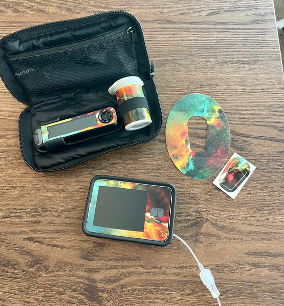 new stickers on t:slim pump, Bayer Contour Next Meter, Bayer Contour Next Strips container with the matching Dexcom G6 tape in the Nebula design