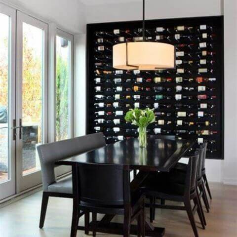 artistic wine display wall in modern dining room