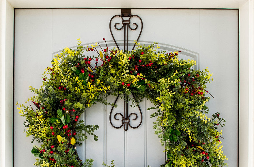 Elegant Wreath Hanger Hanging On A Door