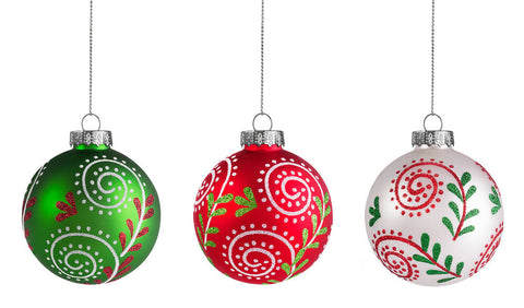 A row of three, hanging decorative Christmas ornaments with glitter detail