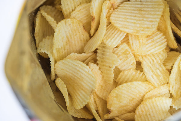 Ribbed potato chips in close-up.  