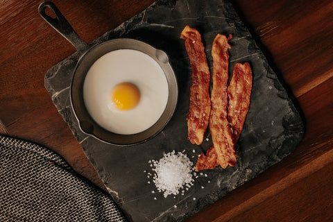 Bacon and fried egg as part of a high-protein diet.