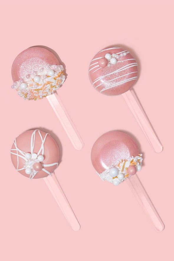 https://cdn.shopify.com/s/files/1/1399/2331/products/halle-round-cakesicle-mold-incrementing-number-fancy-sprinkles-808798_590x.jpg?v=1668037364