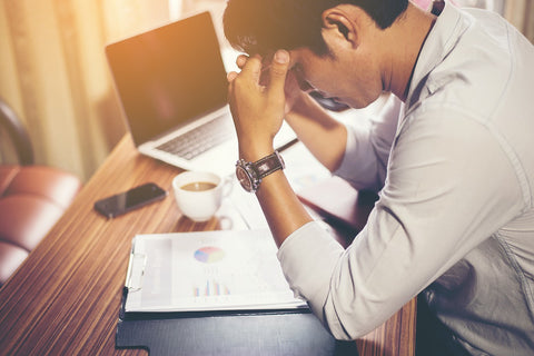 stressed man in need of an eleuthero root supplement