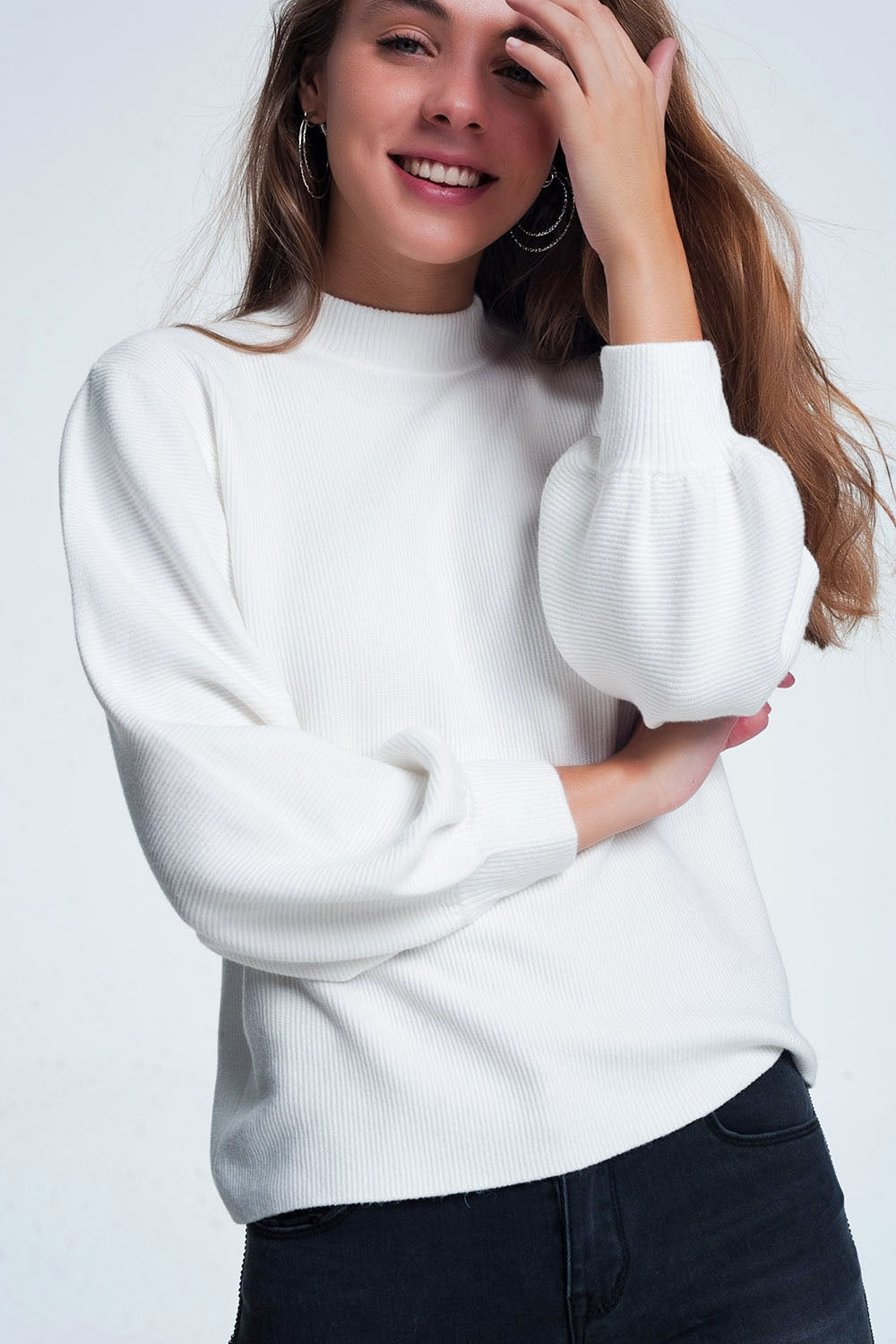 cream colored sweatshirt