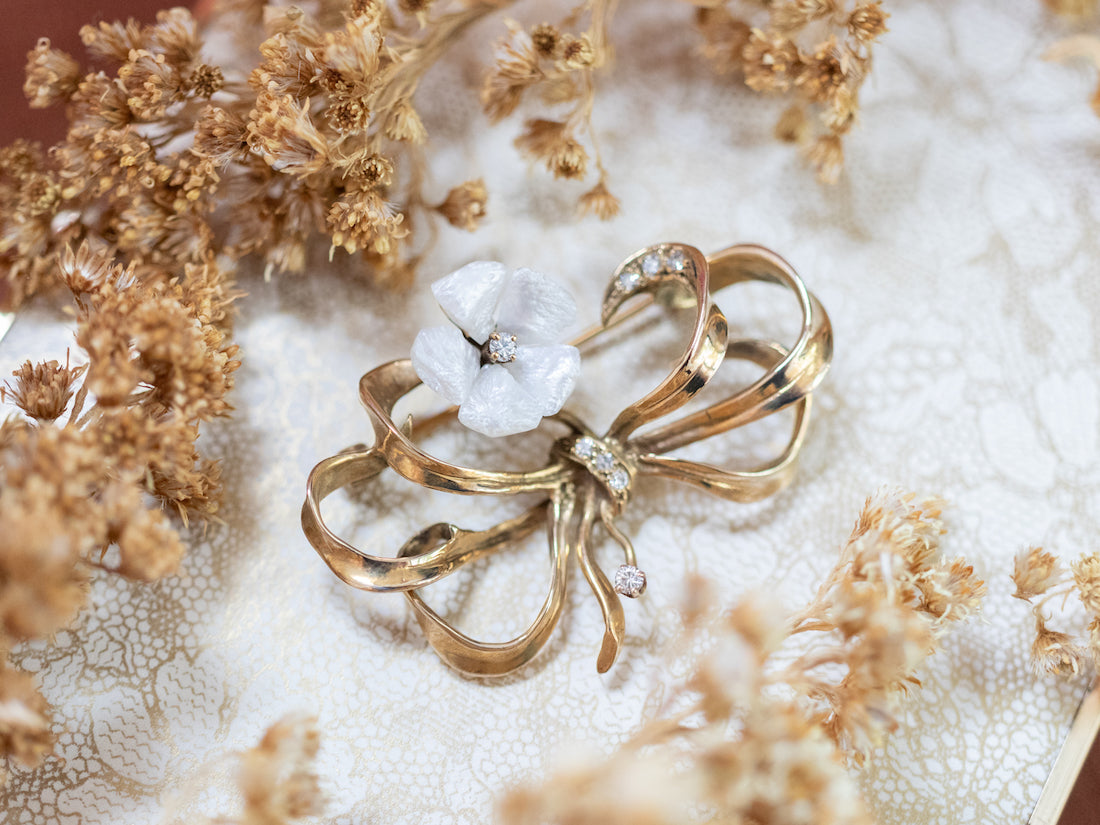 Floral pearl Art Nouveau gold bow brooch