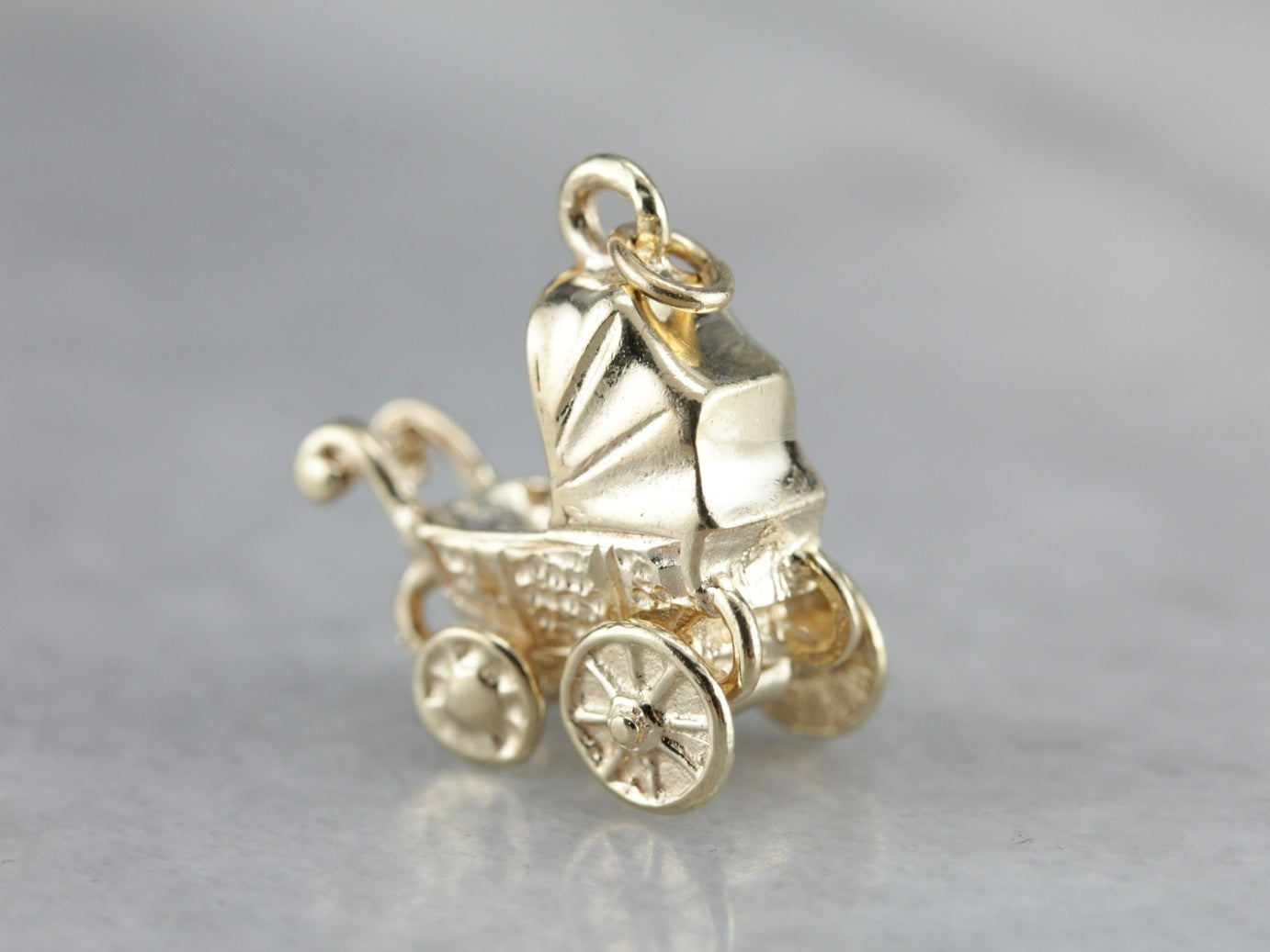 gold baby carriage