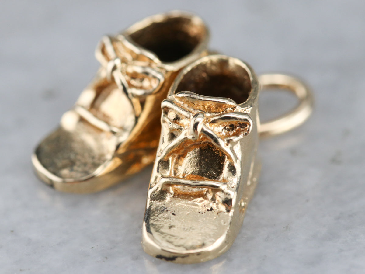 gold baby sneakers