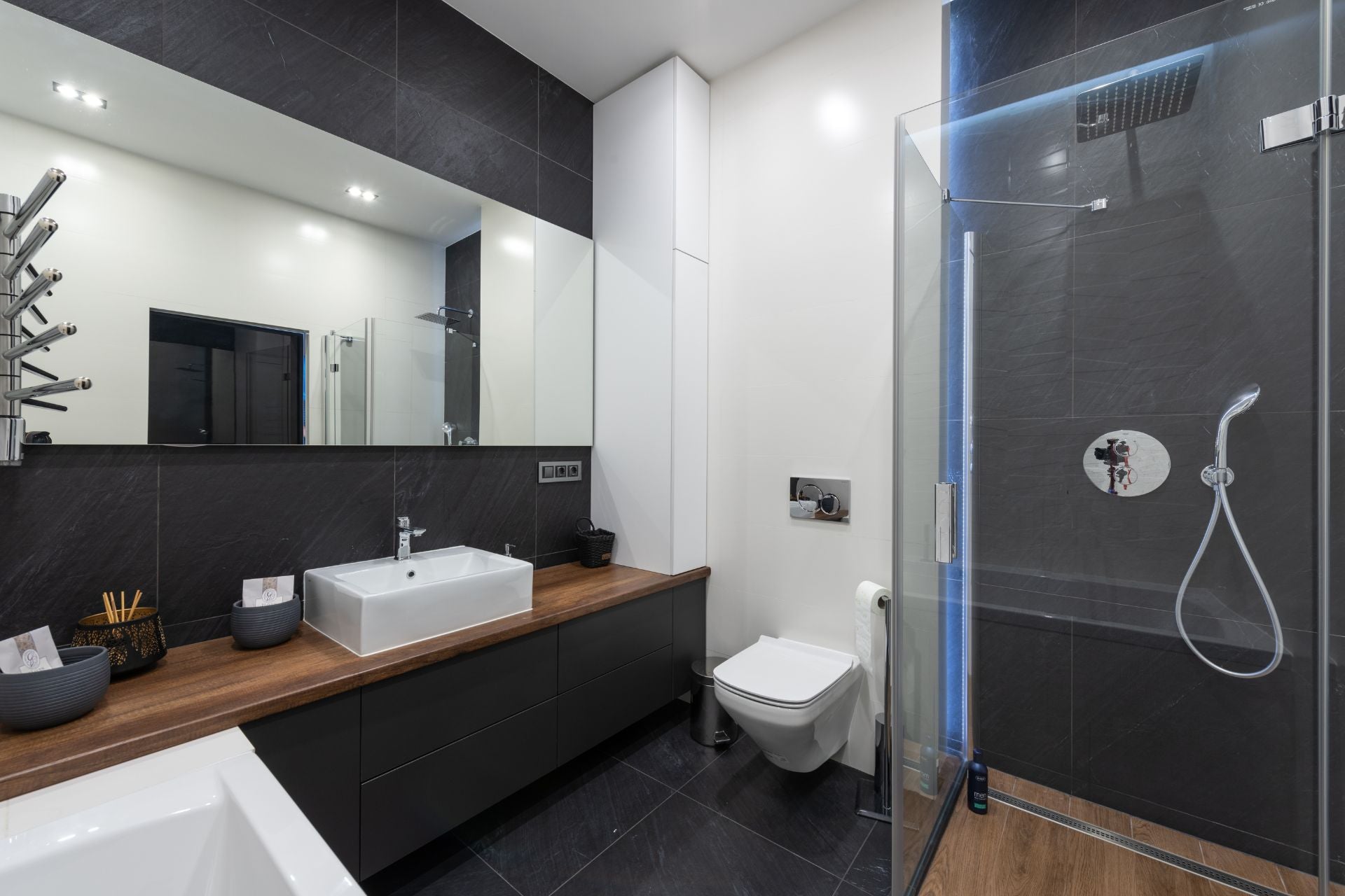 A modern wall-hung toilet in a sleek bathroom