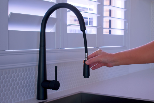 An all-black pull-down faucet