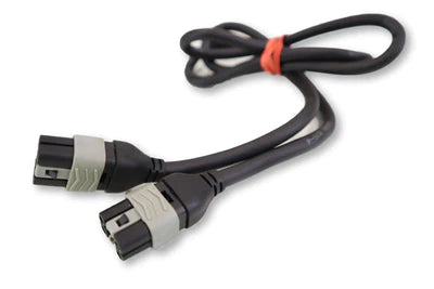 a black wheelchair cable with gray connectors, bundled with a red band