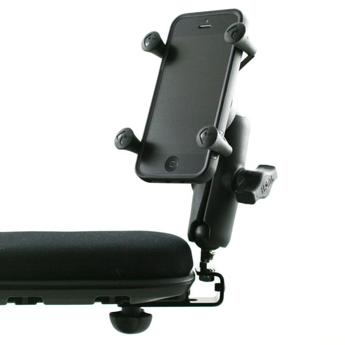 Phone holder attached to the armrest of a power chair