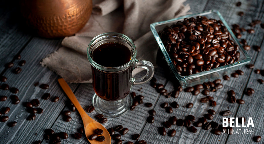 A Cup Of Coffee And Coffee Beans