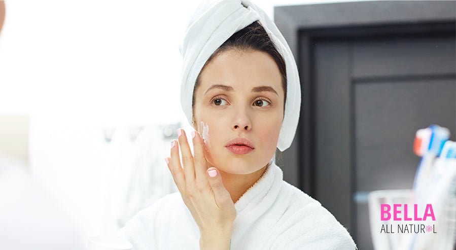 Woman Moisturizing Face