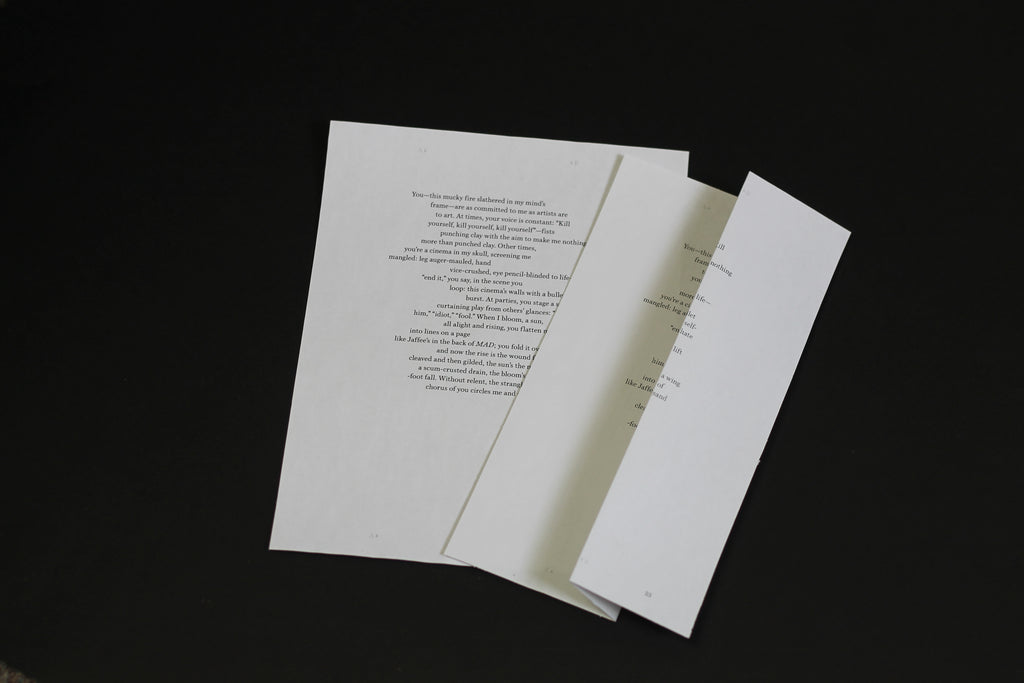 Photo of a fold-in poem.