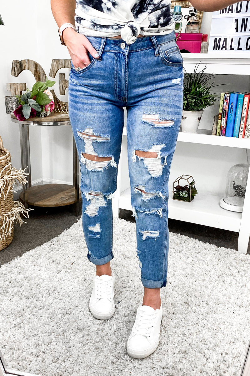 distressed tomgirl jeans