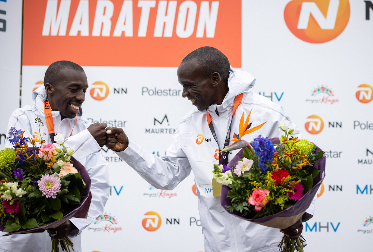 Korir & Kipchoge Celebrating. Photo credit: NN Running Team