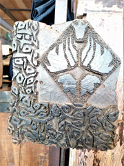 Close up of wood block print that is used when print onto batik fabric