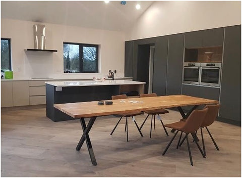 Large reclaimed wooden table in a modern interior 