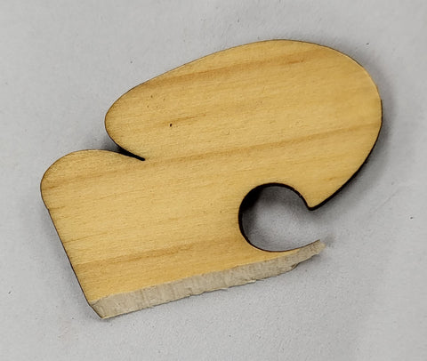 broken piece from a soundhole of a dulcimer