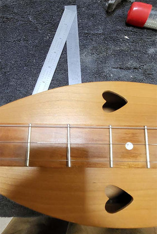 crooked fret added to a folkcraft dulcimer which richard ash had to fix