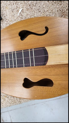 close up of the lower bout of the broken dulcimer soundhole