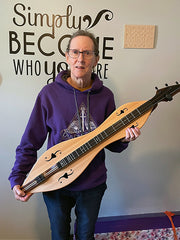 jeannine euckert with her folkcraft dulcimer