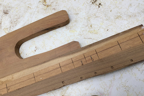 Push stick made of fretboards