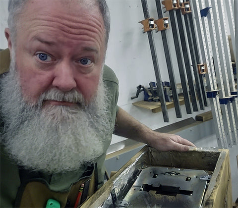 richard ash's beard gets dangerously close to heating elements