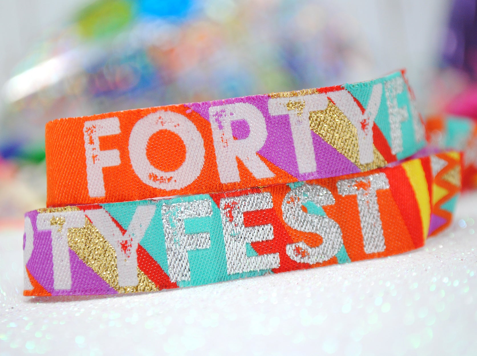 festival themed 40th birthday party wristbands