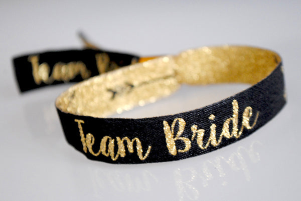 team bride hen do wristbands black and gold