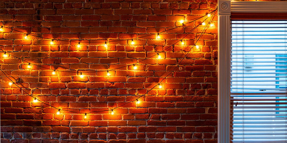 Create a glowing wall with string lights