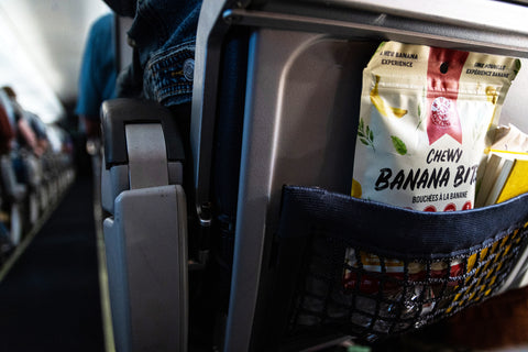 Bringing Nomad Nutrition Chewy Banana Bites as an in flight snack during travels